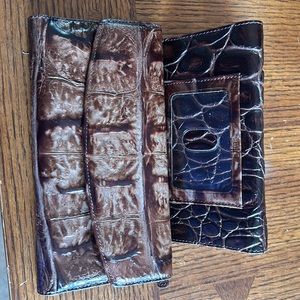 Brahmin wallet and soft checkbook cover.